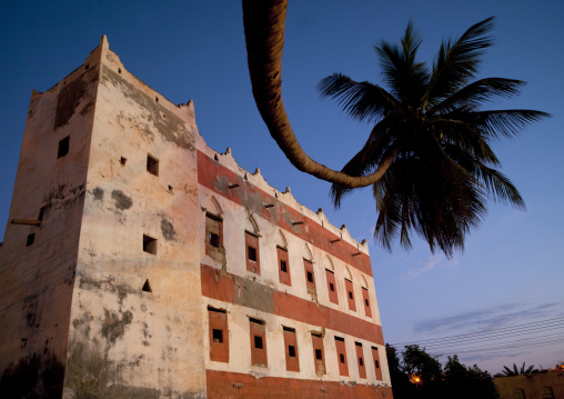 Old Red House In Rose Color  With A Palm Tree, Salalah, Oman