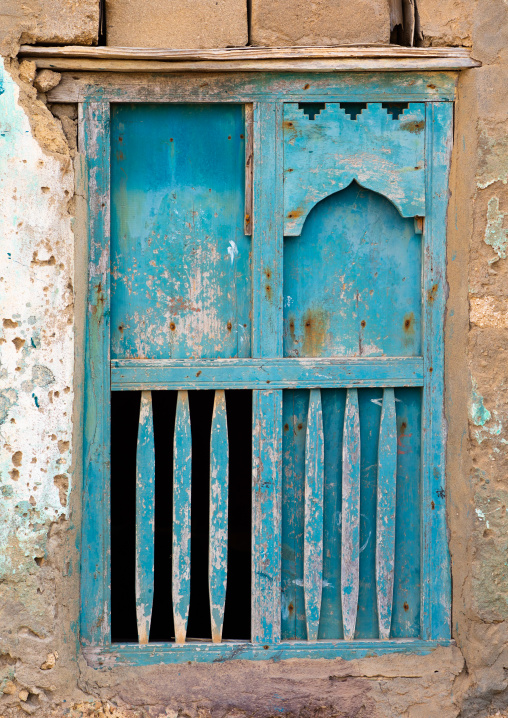 Wooden carved window of an abandoned house, Dhofar Governorate, Mirbat, Oman