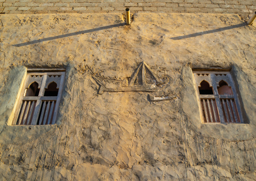 Wooden carved windows with a dhow decoration, Dhofar Governorate, Mirbat, Oman