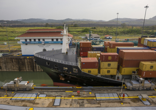 Panama, Province Of Panama, Panama City, Container Ship Passing Through The Miraflores Locks In The Panama Canal