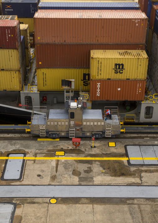 Panama, Province Of Panama, Panama City, Container Ship Passing Through The Miraflores Locks In The Panama Canal