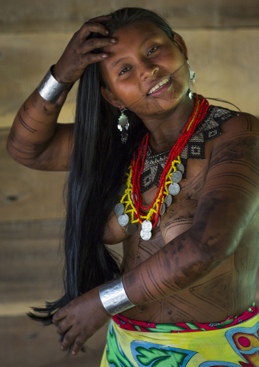 Panama, Darien Province, Bajo Chiquito, Woman Of The Native Indian Embera Tribe Combing Hair