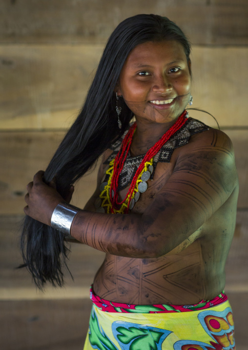 Panama, Darien Province, Bajo Chiquito, Woman Of The Native Indian Embera Tribe Combing Hair