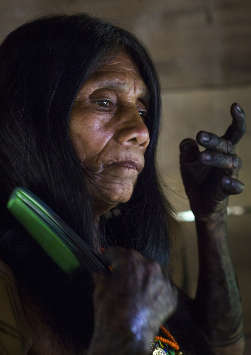 Panama, Darien Province, Bajo Chiquito, Woman Of The Native Indian Embera Tribe Combing Hair