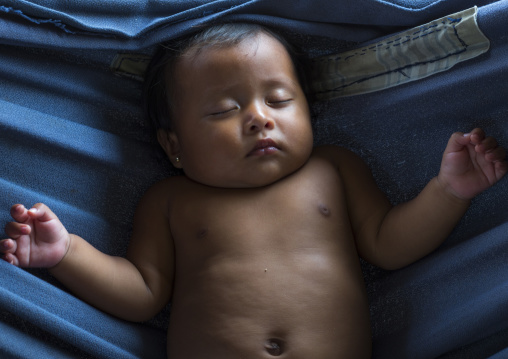 Panama, Darien Province, Bajo Chiquito, Embera Tribe Baby Sleeping In A Hammock