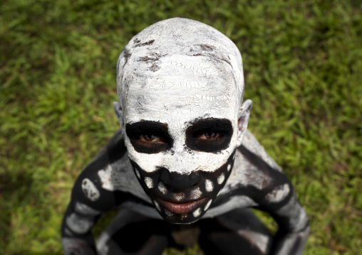 Skeleton tribe boy during a sing-sing ceremony, Western Highlands Province, Mount Hagen, Papua New Guinea