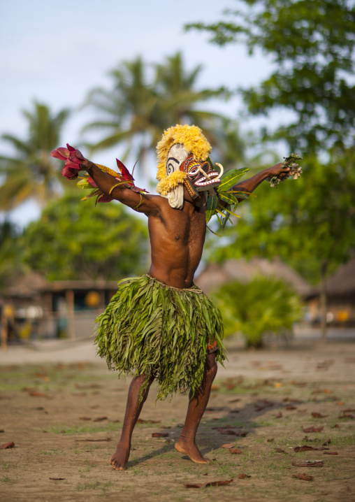 Malagan tatuana masks dance during a funeral ceremony, New Ireland Province, Langania, Papua New Guinea