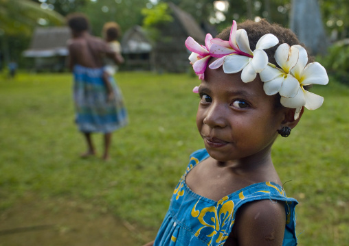 Portrait of a girl with flowers in the hair, Milne Bay Province, Trobriand Island, Papua New Guinea