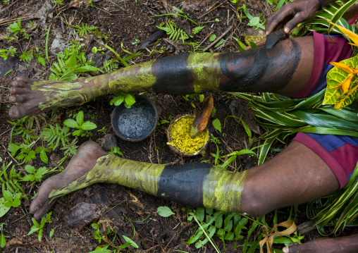 Witchdoctor legs with makeup in the jungle, New Ireland Province, Kavieng, Papua New Guinea