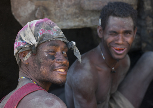 Men digging to find megapode birds eggs in tavurvur volcano ashes, East New Britain Province, Rabaul, Papua New Guinea