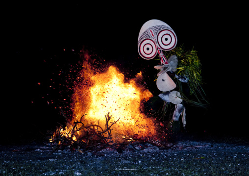 Dancer with a giant mask during a Baining tribe fire dance, East New Britain Province, Rabaul, Papua New Guinea