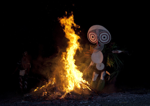 Dancer with a giant mask during a Baining tribe fire dance, East New Britain Province, Rabaul, Papua New Guinea