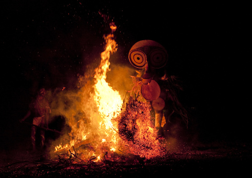 Dancer with a giant mask during a Baining tribe fire dance, East New Britain Province, Rabaul, Papua New Guinea