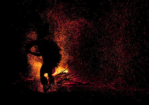 Dancer with a giant mask during a Baining tribe fire ceremony, East New Britain Province, Rabaul, Papua New Guinea