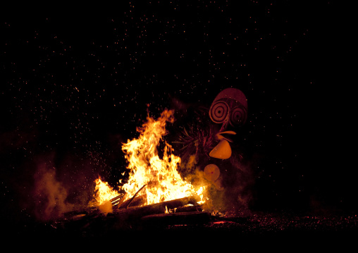 Dancer with a giant mask during a Baining tribe fire ceremony, East New Britain Province, Rabaul, Papua New Guinea