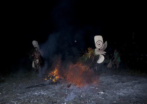 Dancer with a giant mask during a Baining tribe fire dance, East New Britain Province, Rabaul, Papua New Guinea