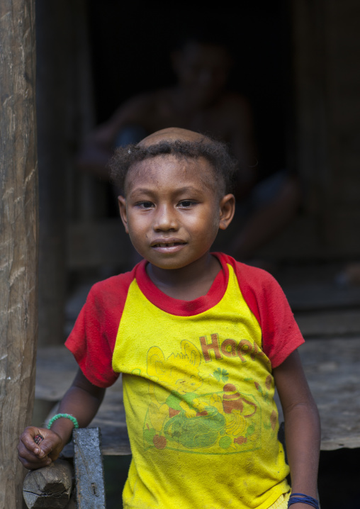 Portrait of a boy with strange haircut, Milne Bay Province, Trobriand Island, Papua New Guinea