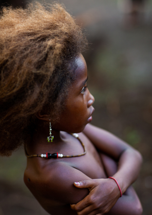 Portrait of an islander girl with blonde hair, Milne Bay Province, Trobriand Island, Papua New Guinea