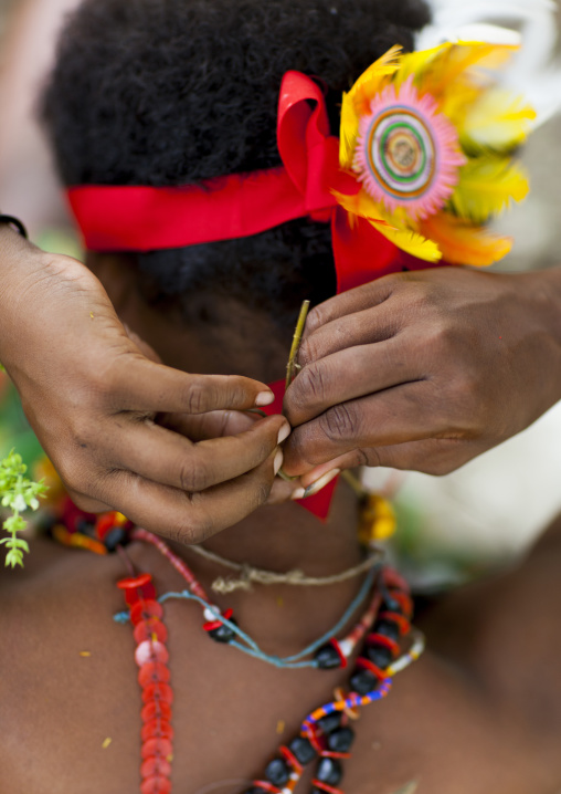 Tribal woman before for a ceremony, Milne Bay Province, Trobriand Island, Papua New Guinea