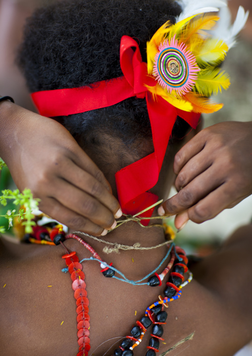 Tribal woman before for a ceremony, Milne Bay Province, Trobriand Island, Papua New Guinea