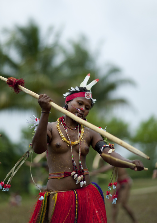 Portrait of a tribal woman in traditional clothing, Milne Bay Province, Trobriand Island, Papua New Guinea