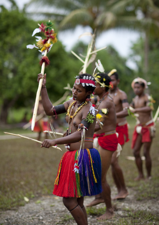 Tribal dancers in traditional clothing during a sing-sing, Milne Bay Province, Trobriand Island, Papua New Guinea