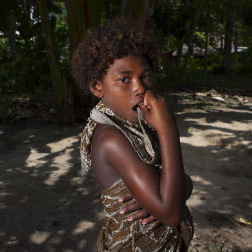 Portrait of a young girl in the forest, New Ireland Province, Kapleman, Papua New Guinea