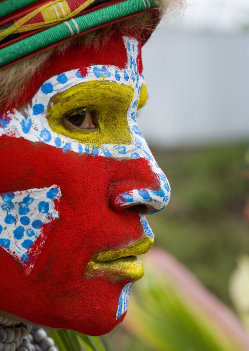 Melpa tribe woman with traditional makeup during a sing sing, Western Highlands Province, Mount Hagen, Papua New Guinea