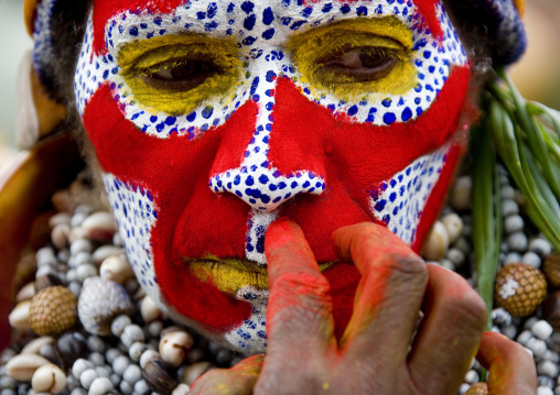 Portrait of a Highlander woman makeup during a sing-sing, Western Highlands Province, Mount Hagen, Papua New Guinea