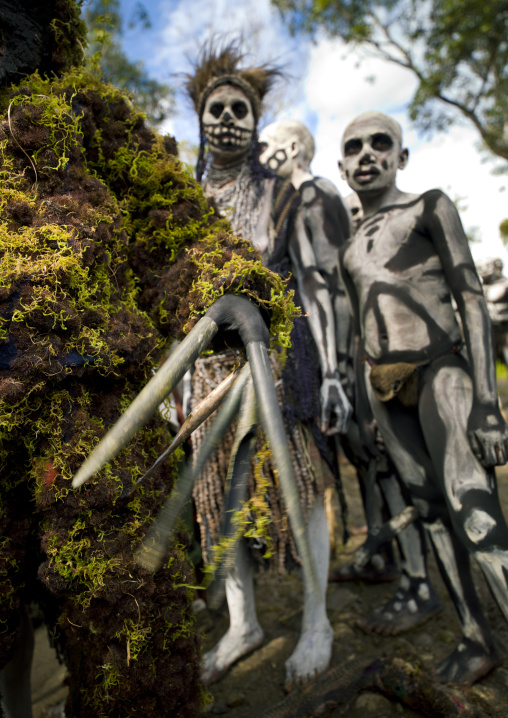 Skeleton tribe men during a sing-sing ceremony, Western Highlands Province, Mount Hagen, Papua New Guinea