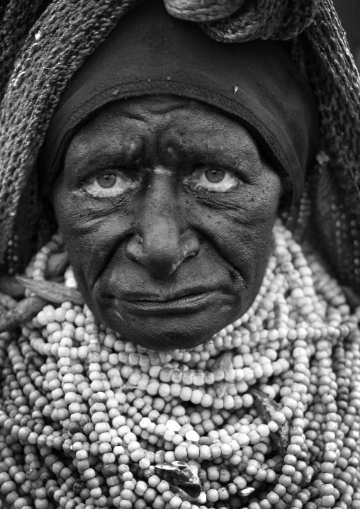 Portrait of a mourning woman with job tears necklaces, Western Highlands Province, Mount Hagen, Papua New Guinea