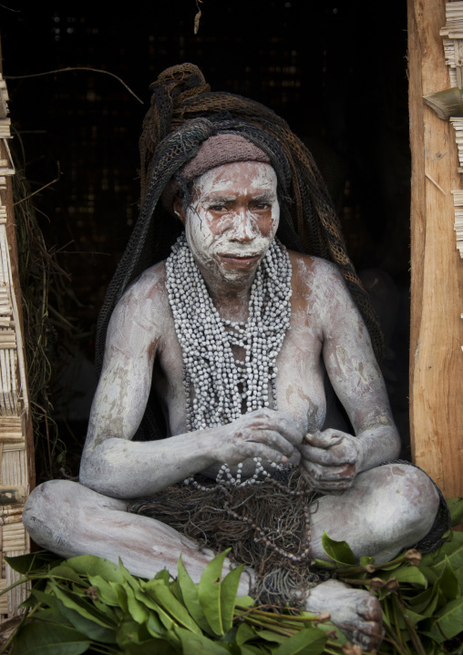 Portrait of a mourning woman with job tears necklaces, Western Highlands Province, Mount Hagen, Papua New Guinea