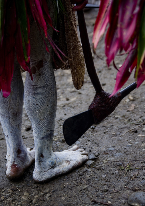 Highlander man with axe during sing sing, Western Highlands Province, Mount Hagen, Papua New Guinea