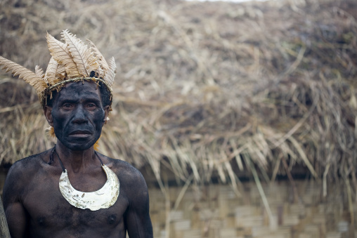 Whagi man tribe with black face during a sing-sing, Western Highlands Province, Mount Hagen, Papua New Guinea