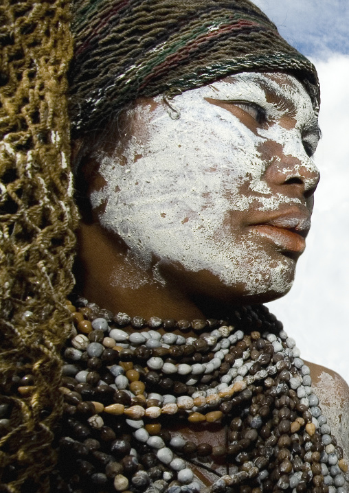 Portrait of a mourning woman with job tears necklaces, Western Highlands Province, Mount Hagen, Papua New Guinea