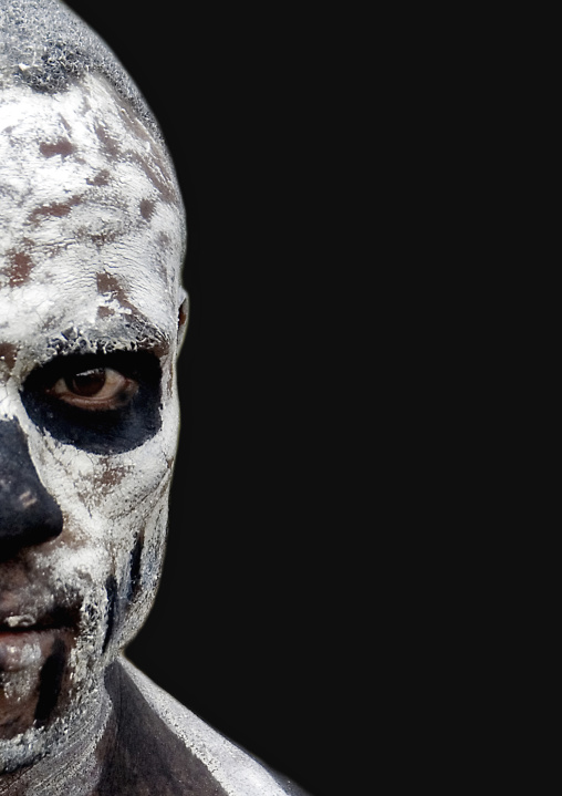 Half face of a Skeleton tribe man during a sing-sing, Western Highlands Province, Mount Hagen, Papua New Guinea