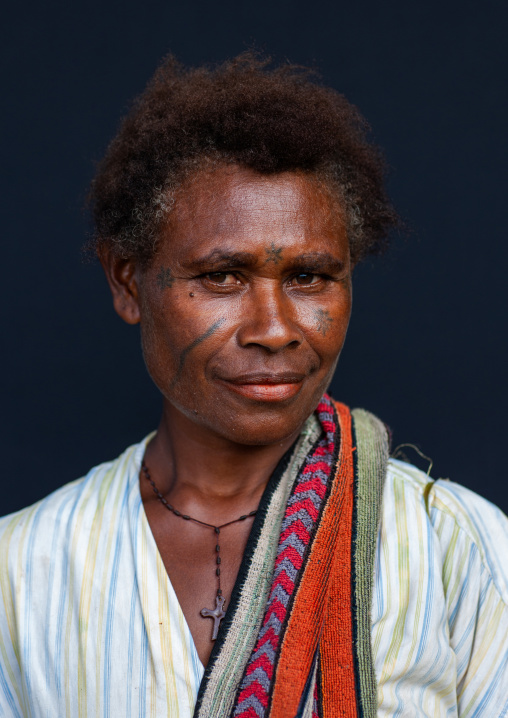 Portrait of a local woman with tattoos on the face, New Ireland Province, Langania, Papua New Guinea