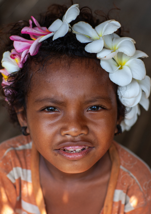 Portrait of a girl with flowers in the hair, Milne Bay Province, Trobriand Island, Papua New Guinea