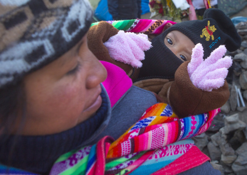 Peruvian Mother And Baby  During The Qoyllur Riti Festival, Ocongate Cuzco, Peru