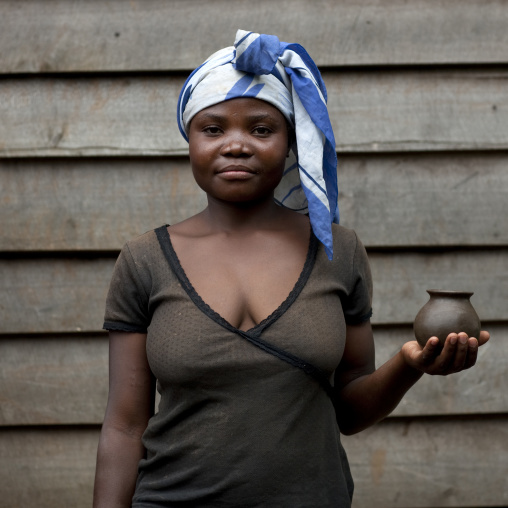 Batwa tribe woman making pottery, Western Province, Cyamudongo, Rwanda