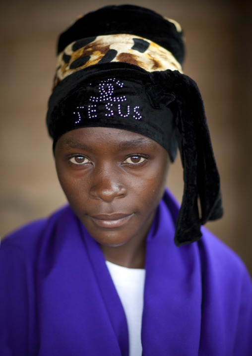 Batwa tribe woman with a jesus headwear, Western Province, Cyamudongo, Rwanda