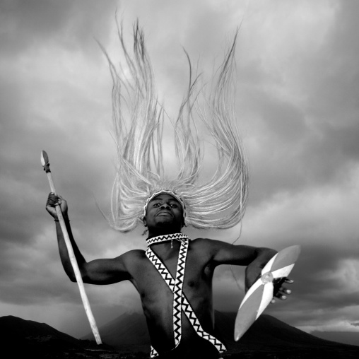 Traditional intore dancer during a folklore event in a village of former hunters, Lake Kivu, Ibwiwachu, Rwanda