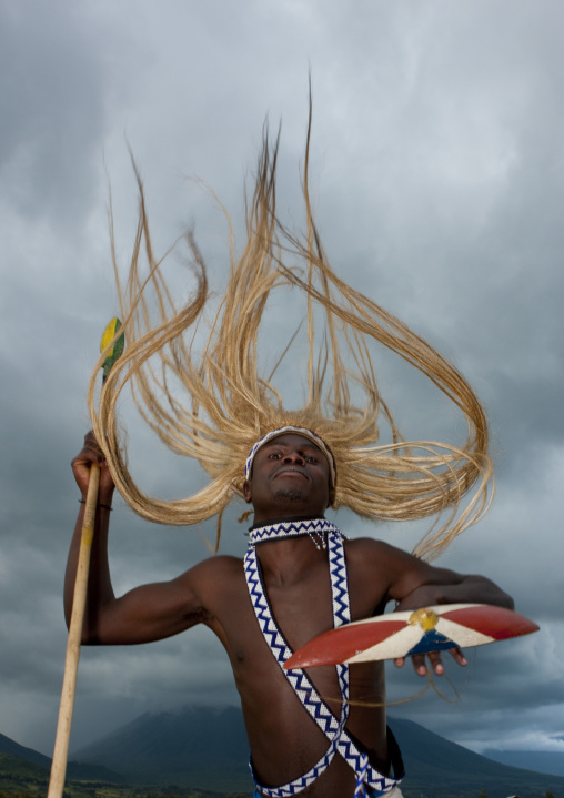 Traditional intore dancer during a folklore event in a village of former hunters, Lake Kivu, Ibwiwachu, Rwanda