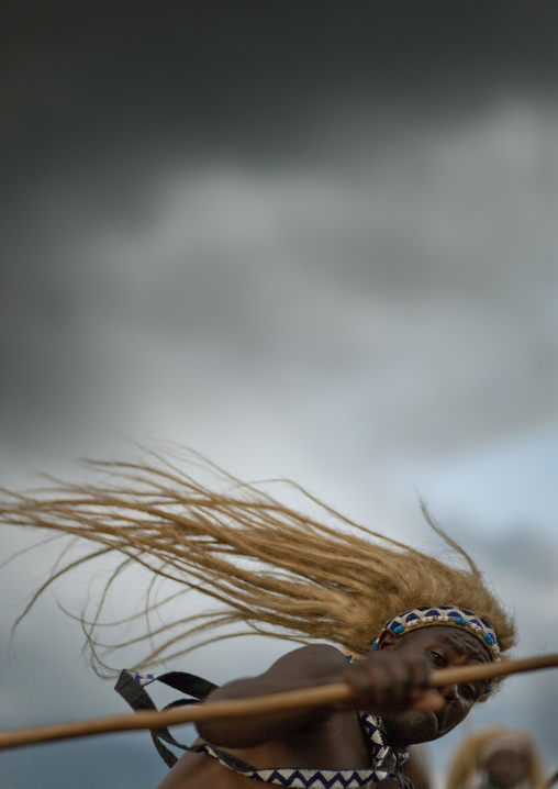 Traditional intore dancer during a folklore event in a village of former hunters, Lake Kivu, Ibwiwachu, Rwanda