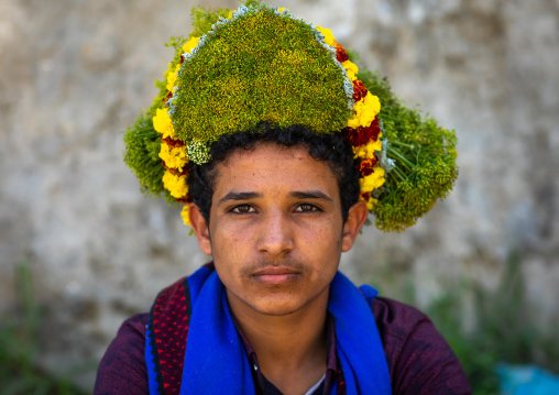 Portrait of a flower man wearing a floral crown on the head, Jizan province, Addayer, Saudi Arabia