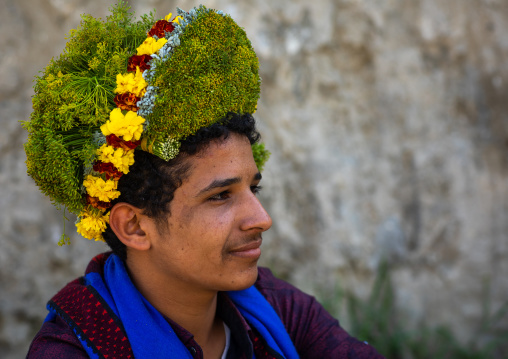 Portrait of a flower man wearing a floral crown on the head, Jizan province, Addayer, Saudi Arabia