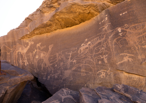 Petroglyphs on a rock depicting hunters, Najran Province, Thar, Saudi Arabia