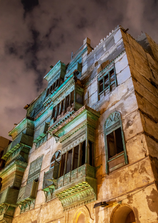 Historic house with wooden mashrabiyas in al-Balad quarter at night, Mecca province, Jeddah, Saudi Arabia