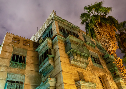 Historic house with wooden mashrabiyas in al-Balad quarter at night, Mecca province, Jeddah, Saudi Arabia