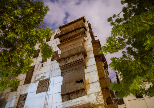 Historic house with wooden mashrabiyas in al-Balad quarter at night, Mecca province, Jeddah, Saudi Arabia